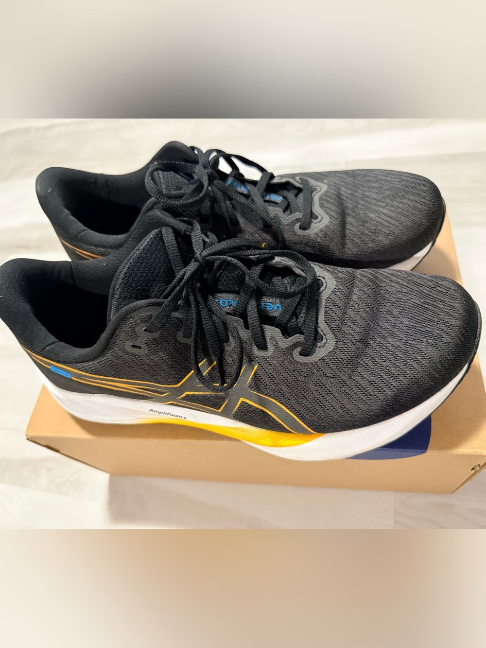 ASICS Black Running Shoes with accents